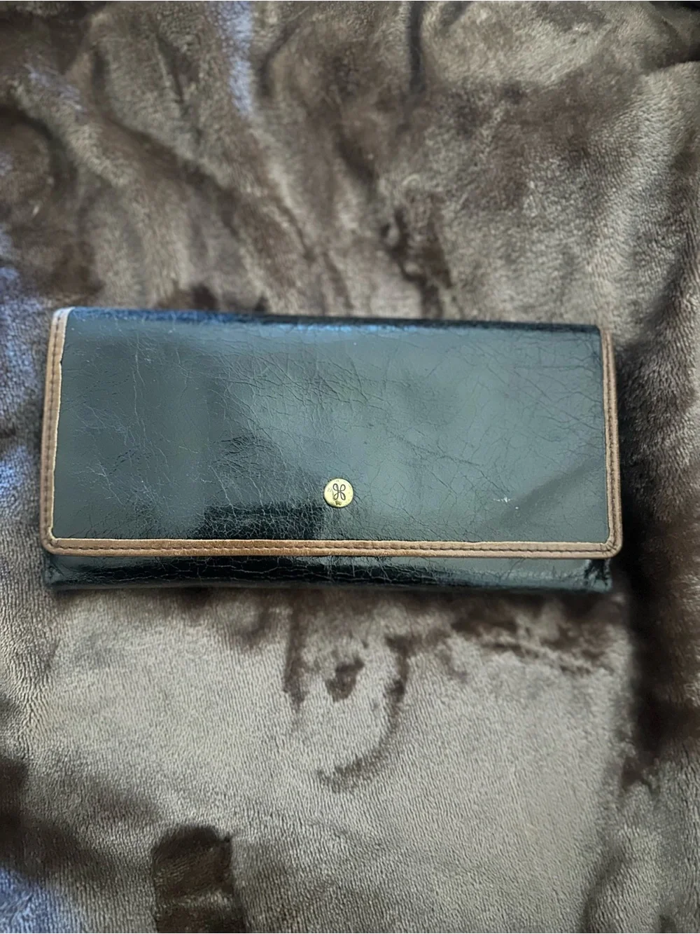 Black Leather Wallet with Brown Trim and Gold Logo
